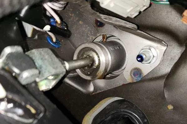torn down clutch master cylinder showing lipped cup seal and bore scoring